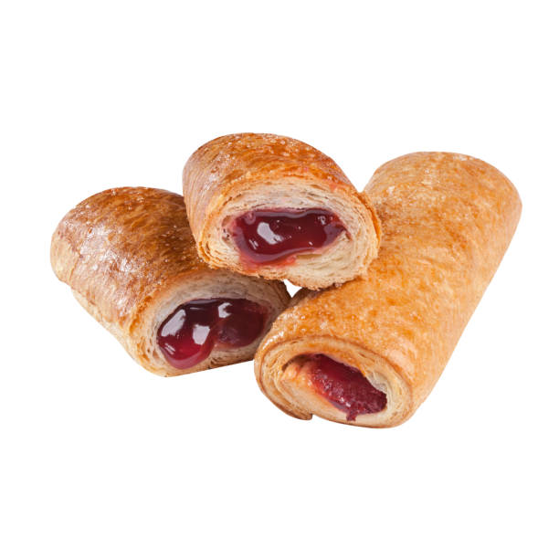 istock Freshly baked puff rolls with cherry jam isolated on white background 1371534782