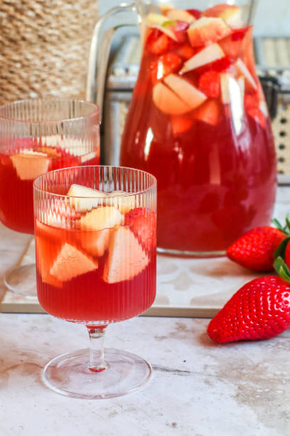 Strawberry Sangria aperitif drink for summer party Strawberry Sangria aperitif drink for summer party punch drink stock pictures, royalty-free photos & images