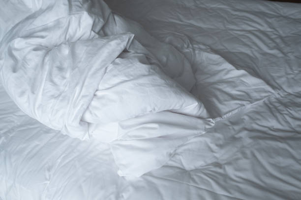 istock white bed background, after sleep, dirty bed 1371535881