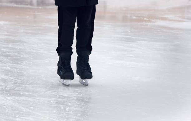 istock legs of people skating closeup 1371536773