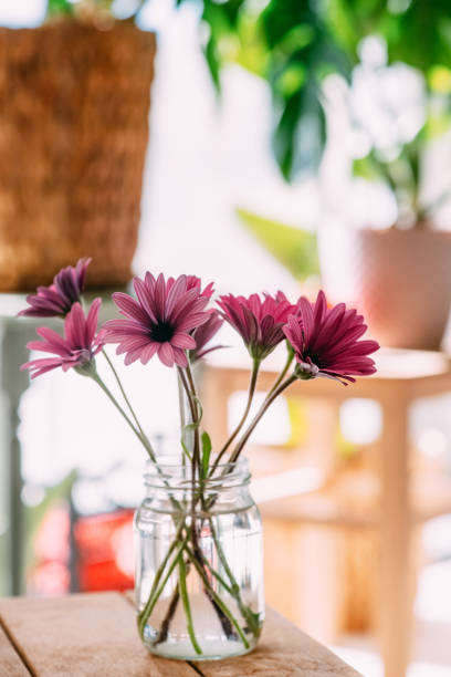 istock Pink Flowers in a Vase 1371537721