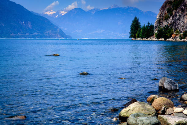 istock Rocky shore, lake and mountains 1371539779