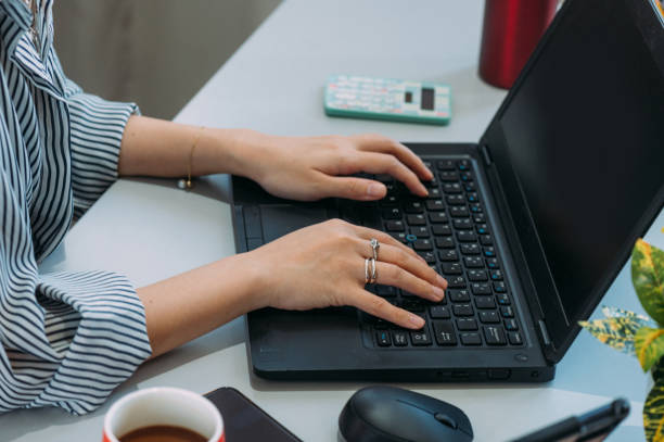 istock Fashionable woman working with notebook 1371543719