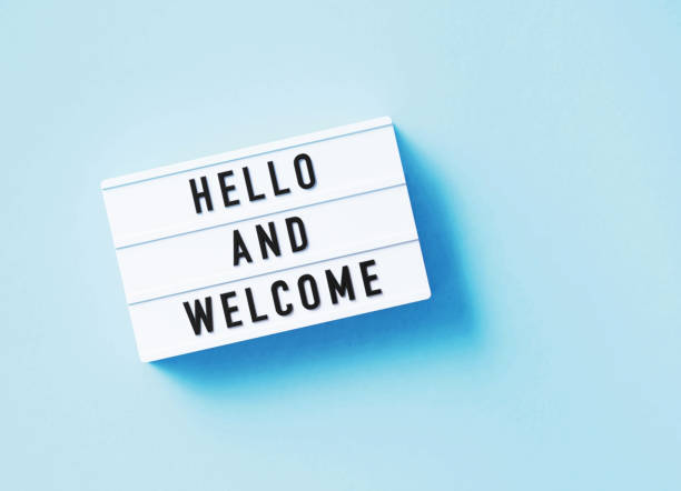 Hello And Welcome Written White Lightbox Sitting On Blue Background Hello and welcome written white lightbox sitting on blue background. Horizontal composition with copy space. hello single word photos stock pictures, royalty-free photos & images