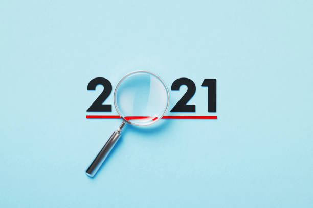 istock Magnifier Forming 2021 On Blue Background 1371548867