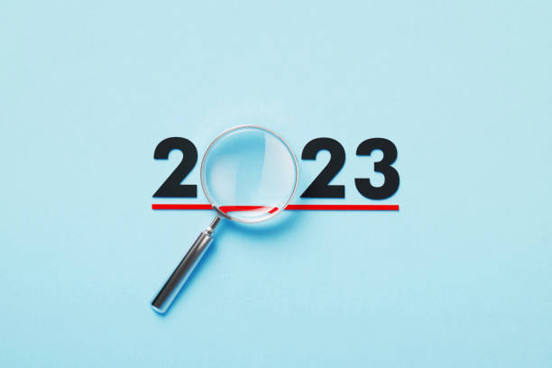 istock Magnifier Forming 2023 On Blue Background 1371549086