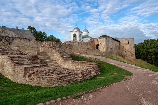 Izborsk fortress, the Nikolsky Gate and St. Nicholas (Nikolsky) Cathedral (XIV-XVII century) on a sunny summer day, Izborsk, Pskov region, Russia