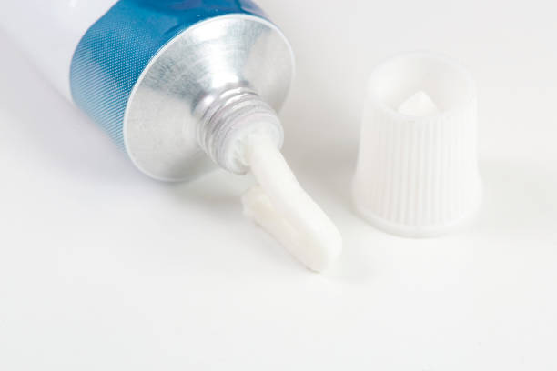 Close up image of ointment tube with squezzed product stock photo