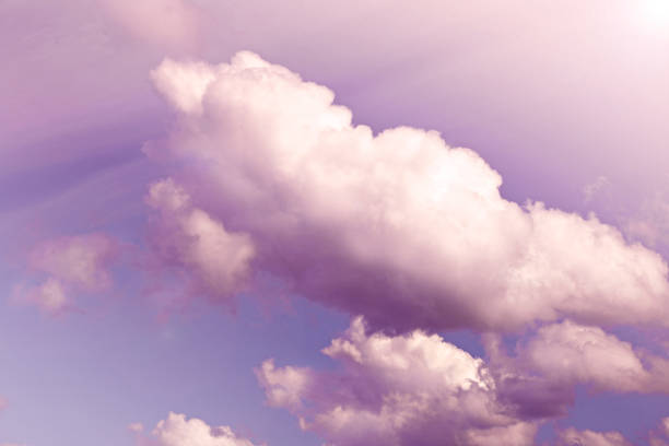 istock Heaven background.Clouds in pink and purple colors.romantic sky. clouds background. 1371551093