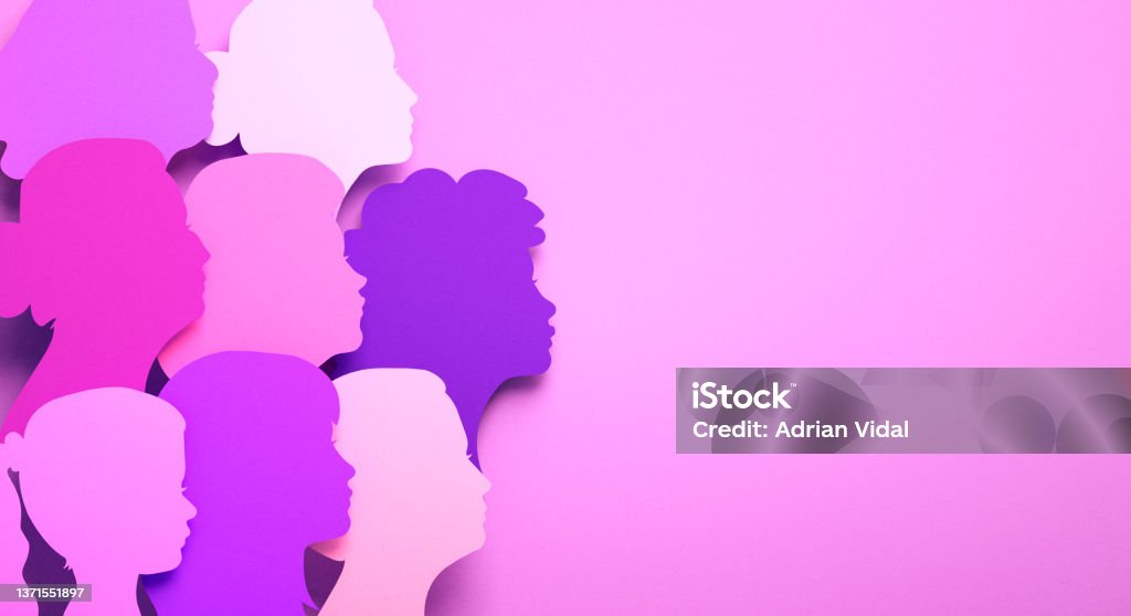 International Women's Day poster with silhouettes of multicultural women's faces in paper cut style and copy space. Sisterhood, female independence and equality in 3D illustration International Womens Day Stock Photo