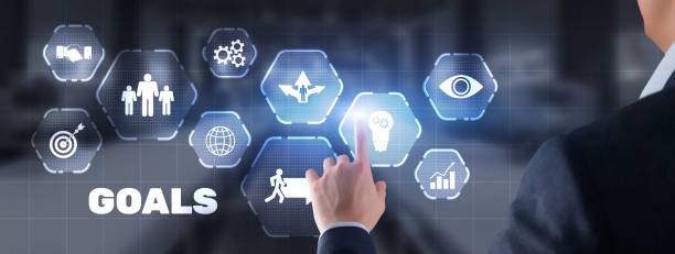 istock Goal achievement concept. Man presses his finger on a virtual screen 1371552786
