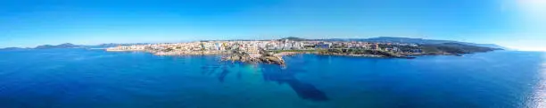 Panoramic view of Alghero shore on a sunny day. Sardinia, Italy