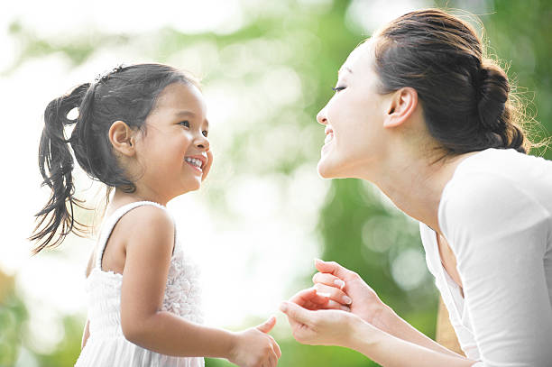 Mum and daughter spending time together in the park