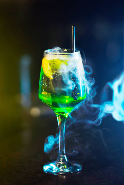 istock Cold fresh green cocktail with lime and mint 1371554268