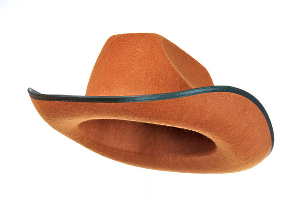 Cowboy Hat Brown Cowboy Hat isolated on white cowboy hat stock pictures, royalty-free photos & images