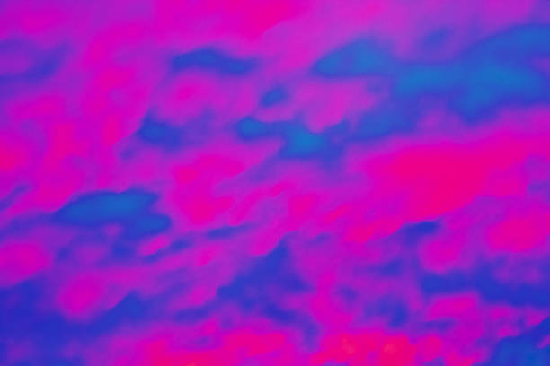 Abstract Cloudscape background in Neon Pink and Blue Pantones