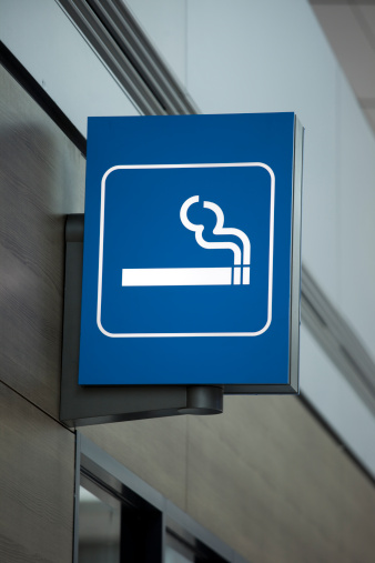 Airport information sign.  Smoking area.