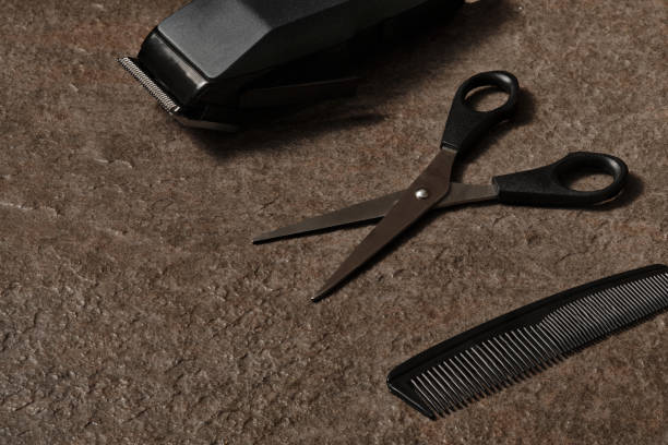 istock Hair cutting kit at stone countertop 1371565174