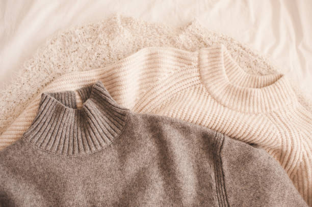 istock Woolen knitted jumpers closeup 1371565356