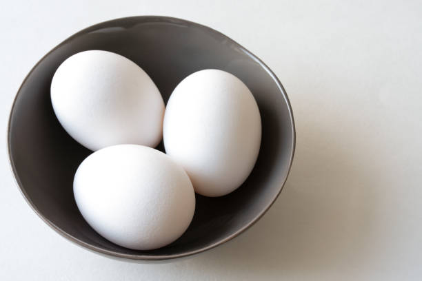 Chicken Eggs in a Bowl stock photo