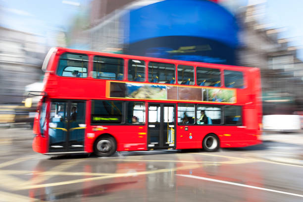 istock Motion Blurred Red Double Decker Bus in London, Piccadilly Circus 1371574063