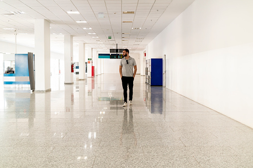 Photo of a man in a modern space.