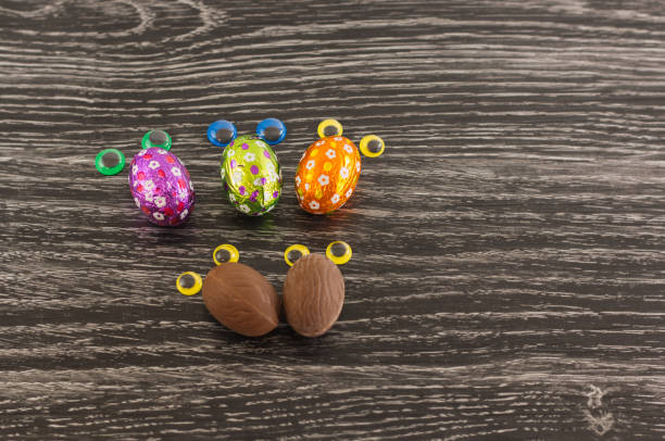 easter eggs with eyes stock photo
