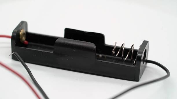 istock Battery connector box for AA AAA cells at white isolated background 1371585594