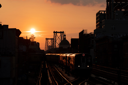 Subway train at sunset in Williamsburg, Brooklyn.