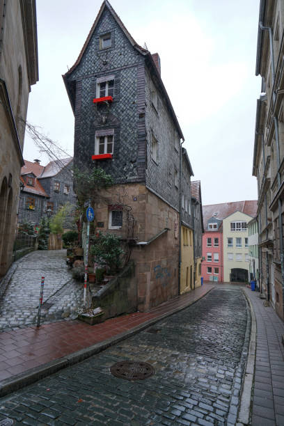 Old narrow house with slate slabs in Fürth