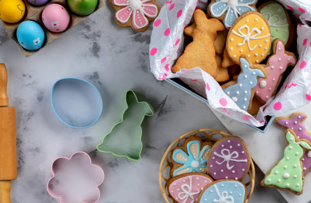Greeting card with Easter cookies and gingerbread molds on a white background.