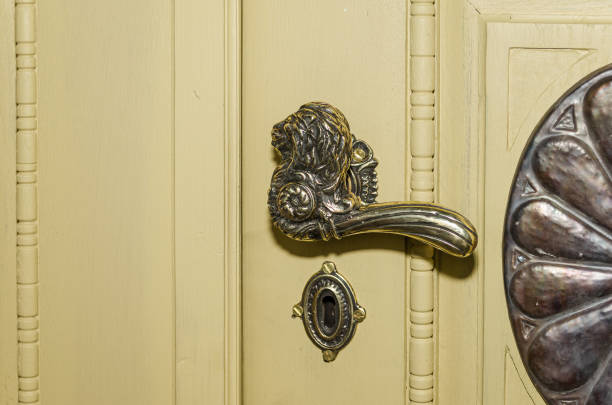 Metal door handle with lion.