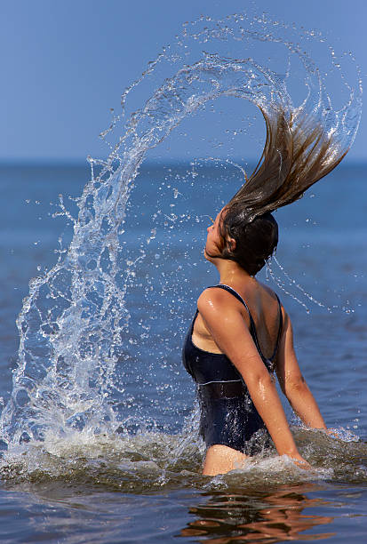 istock Girl splashing water. 137159530