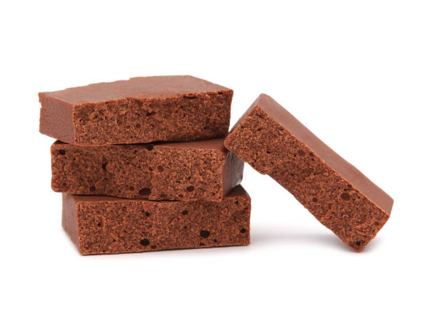 istock Cocoa powdered milk bar isolated on white 1371596961
