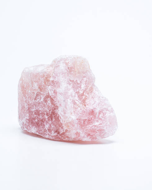 istock Pink crystal rock on a white background. 1371596980