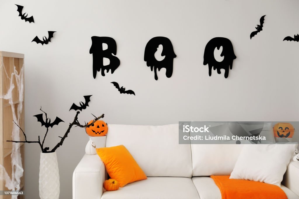 Stylish room interior with creative Halloween decor Halloween Stock Photo