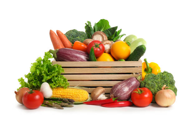 istock Wooden crate with fresh vegetables on white background 1371609258