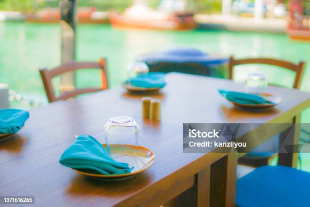 Riverside Restaurant Stock Photo - Download Image Now - Architecture, Chair, Color Image
