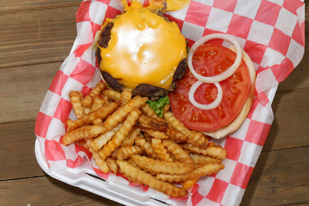 istock Cheeseburger with French Fries 1371618451