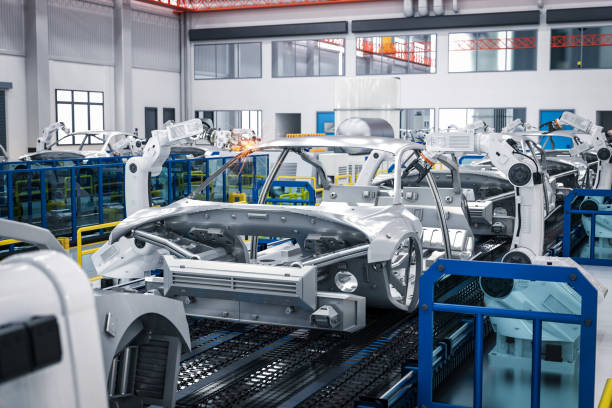 istock Automation robot assembly line in car factory 1371620602