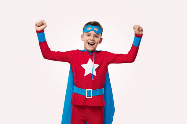 istock Strong superhero celebrating victory in studio 1371620666