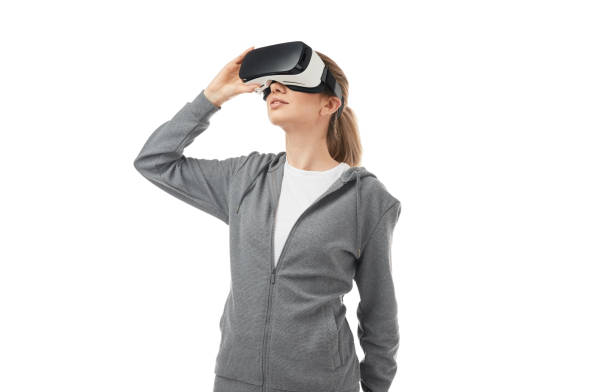 istock Woman exploring cyberspace in VR glasses 1371620682