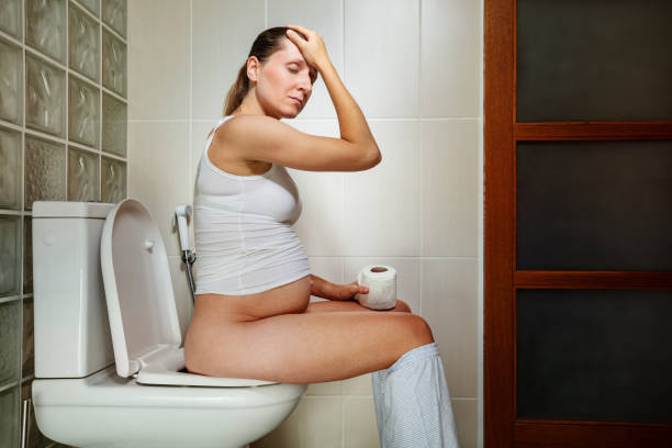 istock Pregnant woman's stomach and digestion problems illustraation 1371621383