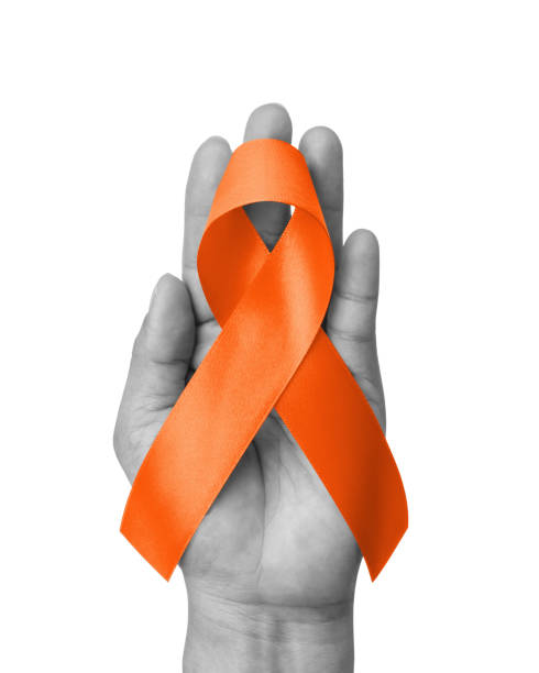 Orange ribbon isolated on white background (clipping path) awareness on leukemia, kidney cancer, multiple sclerosis, lupus, ADHD illness, self-injury and animal abuse Orange ribbon isolated on white background (clipping path) awareness on leukemia, kidney cancer, multiple sclerosis, lupus, ADHD illness, self-injury and animal abuse self harm photos stock pictures, royalty-free photos & images