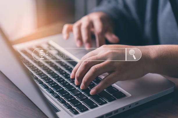 istock People are using the internet to search for information on laptop, Data Search Technology Search Engine Optimization. using internet technology for business purposes. SEO. Internet of Things 1371642878