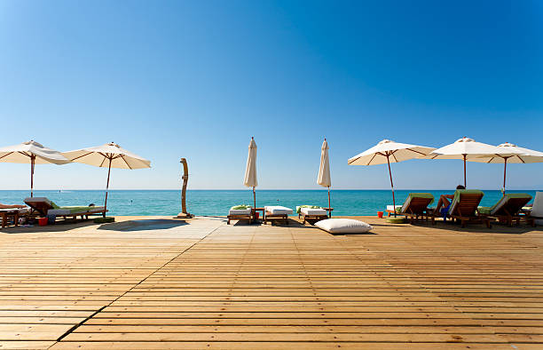 istock Sun Chairs and umbrellas 137164365
