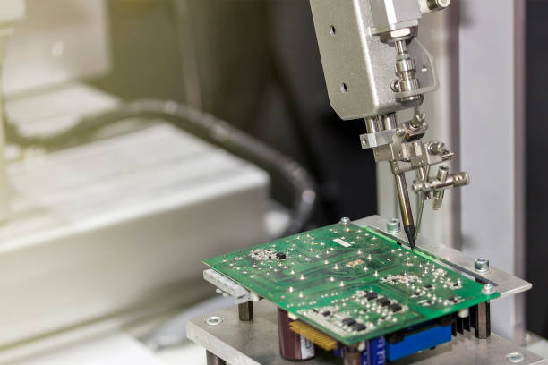 istock robotic system for automatic point soldering for printed and assembly electric circuit board ( PCB ) manufacturing in industrial 1371648659