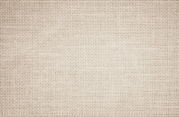 istock Jute hessian sackcloth burlap canvas woven texture background pattern in light beige cream brown color blank. Natural weaving fiber linen and cotton cloth texture as clean empty for decoration. 1371654628