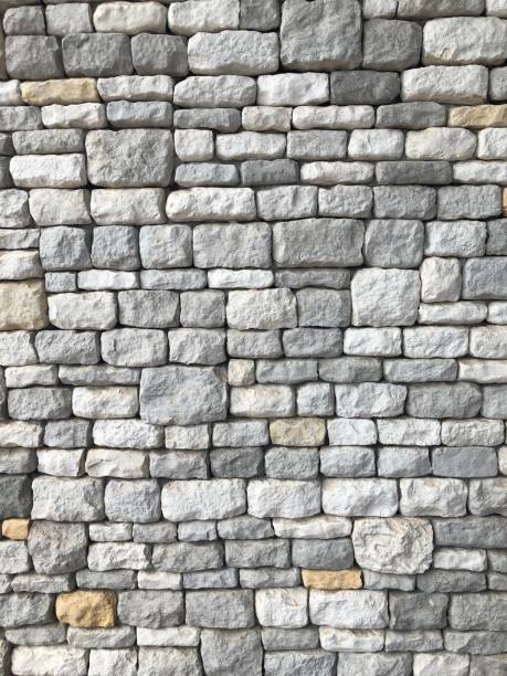 istock Vertical plane of natural cobblestone wall 1371659327