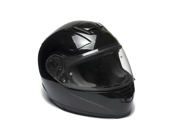 istock Closeup black motorcycle helmet white background 1371659866